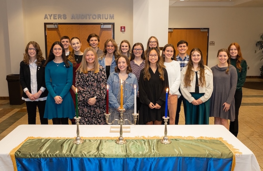 the new members of the Alpha Chi National Honor Scholarship Society pose for a photo