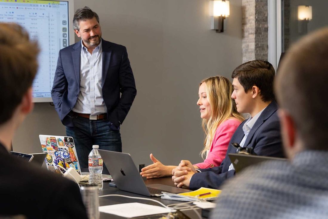 A meeting of the business analytics team