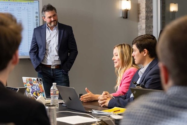 A meeting of one of the business analytics classes