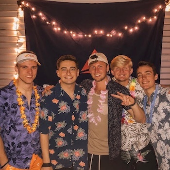 students posing together at an event