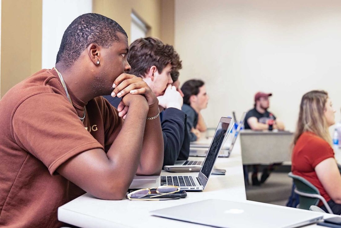 Students listening to a class lecture