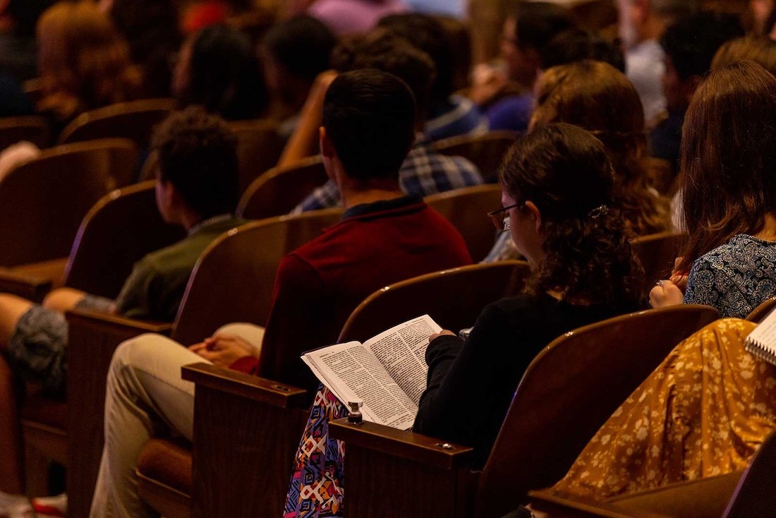 Students listening in chapel