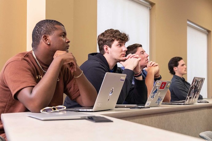 Students listening attentively in class