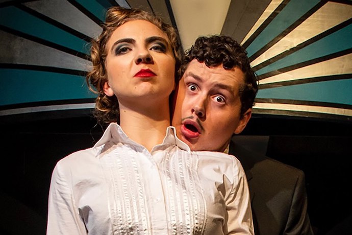 Two theatre students during a performance