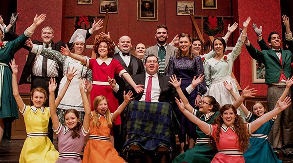 A group of students on stage during a theatre performance
